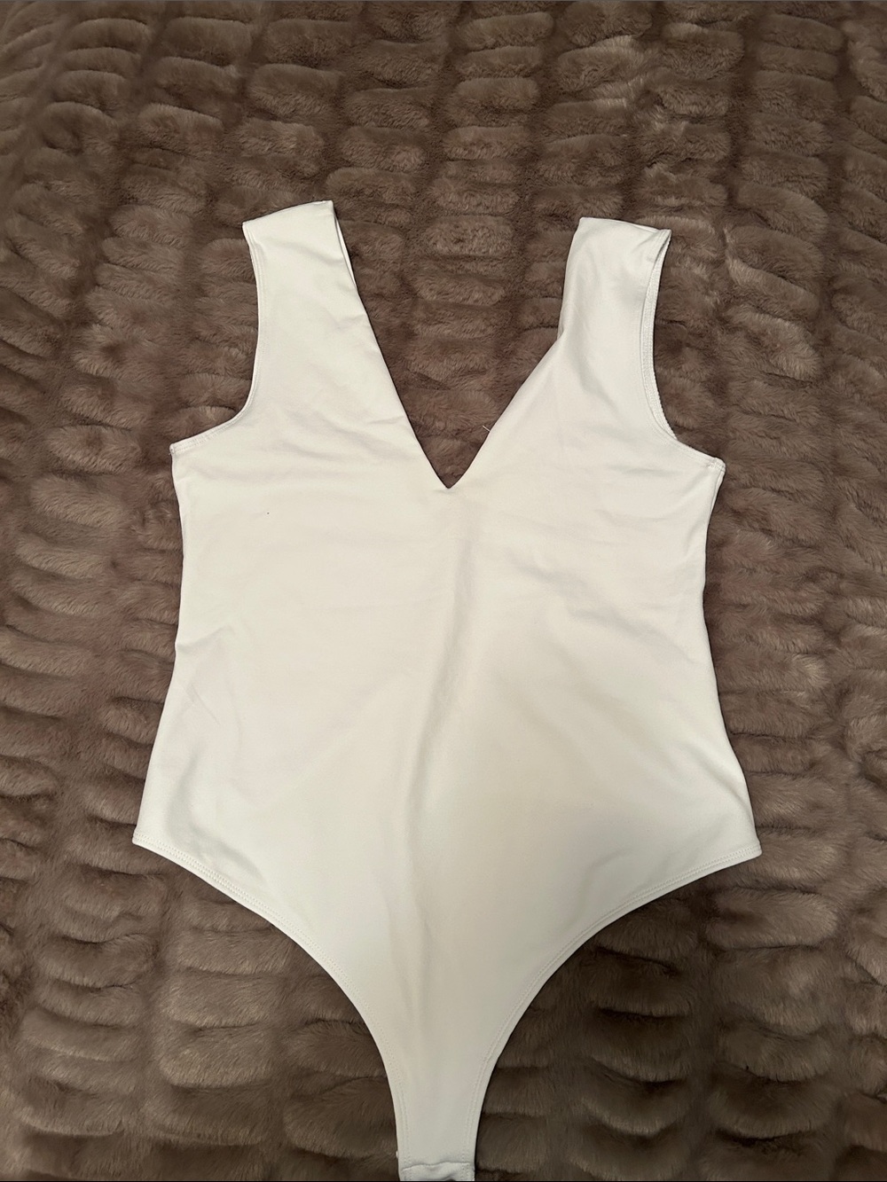 White V-Neck women’s One Piece bodysuit